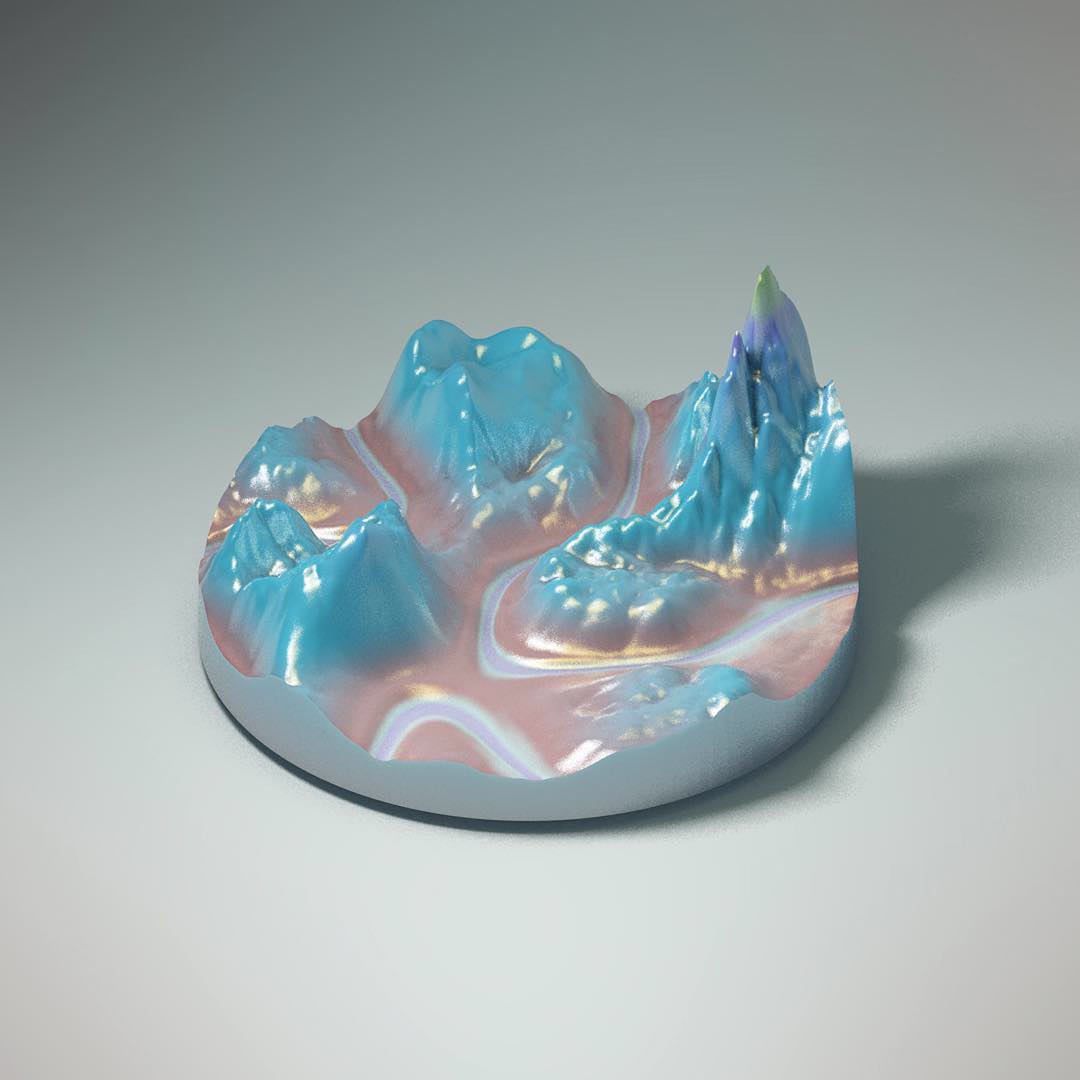 A round slab of terrain with glossy turquoise peaks and pink valleys on a pale surface.